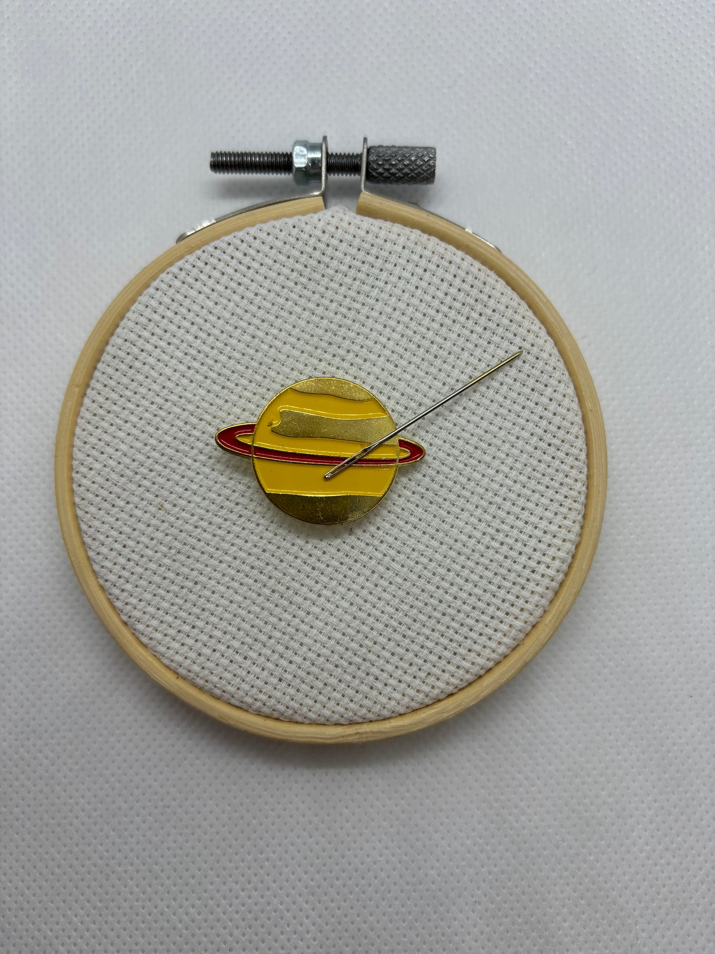 Planet Needle Minder