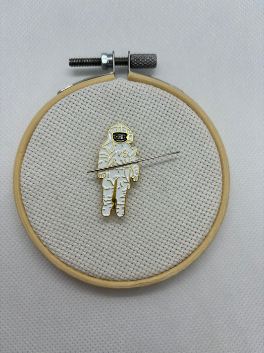 Astronaut Needle Minder